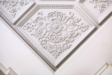 Stucco on the ceiling. Concept for interior decoration.