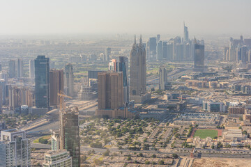 Fototapeta na wymiar DUBAI, UAE - December, 2020: Aerial city view from helicopter. Dubai is a fast advancing metropolis.