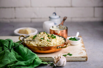 Alfredo pasta sauce with garlic and Parmesan .selective focus