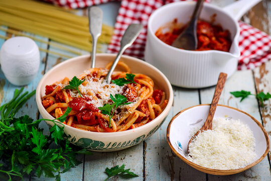 Bucatini all Amatriciana sauce with  Parmesan .selective focus