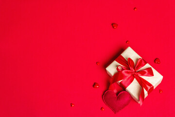 Zero waste gift boxes with festive ribbons on matte rad background