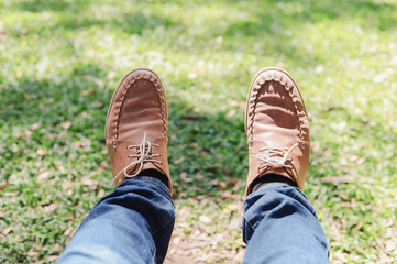 Men's legs wearing leather shoes