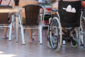 On territory of hotel there is wheelchair in which child sits. Accessible infrastructure for people...