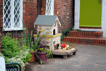 Fototapeta na wymiar Ornate Colourful Animal House in Garden 
