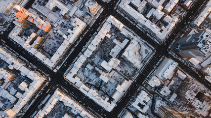 Panoramic aerial view of winter city Kyiv covered in snow