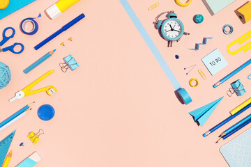 School supplies collection on pink background. Back to school concept.	
