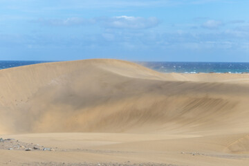 Wind moving the dunes