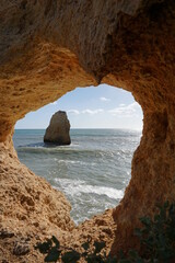 Scenic View Of Sea Seen Through Rock Formation