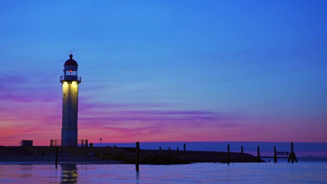 Beautiful view of the lighthouse under blue night sky in Hellevoetsluis, South Holland, Netherlands