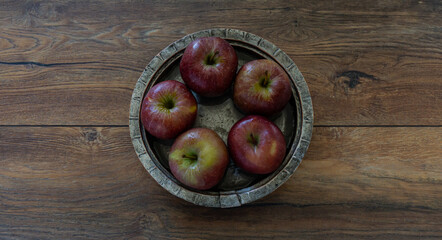 apples in a wooden bowl