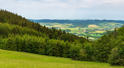 Obraz premium Valasske Prikazy and Studlov village with hilly surrounding in Czech republic