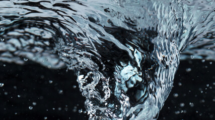 Detail of whirling water with bubbles