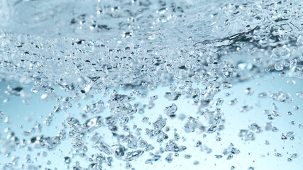 Detail of waving water with bubbles