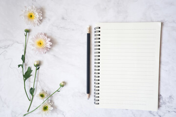 Naklejka premium Cropped shot view of white office desk table with the office equipments, and other office supplies on the modern space, flat lay.