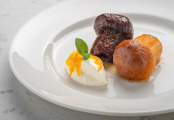 Italian dessert baba from Naples on plate isolated on white, close up