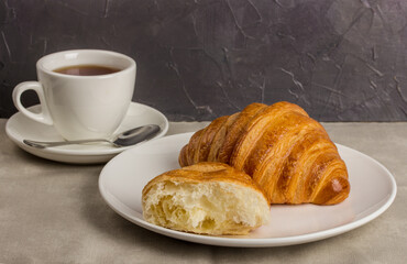 Breakfast with croissant selective focus