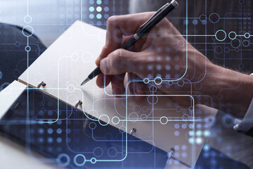Arm in formal wear writing down some ideas using phone to create innovative software to provide a completely new high-tech service. Close up shot. Hologram tech graphs. Concept of Dev team