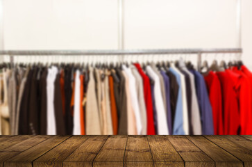 Empty wood table top on shelf in supermarket blurred background, wooden table and shop