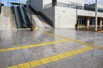 Bright yellow tactile paving for the visually impaired