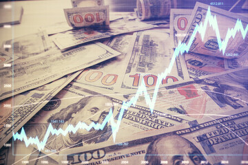 Multi exposure of forex chart drawing over us dollars bill background. Concept of financial success markets.