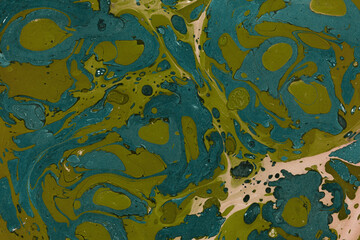 Colorful marble ink texture on watercolor paper background. Marble stone image. Bath bomb effect. Psychedelic biomorphic art.