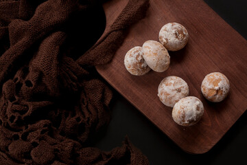 Delicious Russian gingerbread cookies on a wooden background. View from above. 