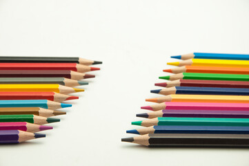 colored pencils on a white background. education concept. illustration of training.