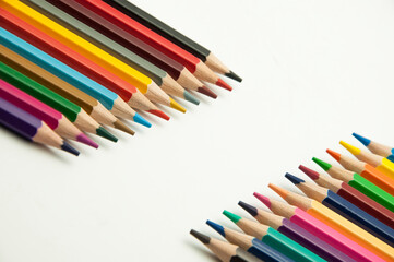 colored pencils on a white background. education concept. illustration of training.