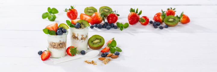 Strawberry yogurt fruit breakfast spoon healthy eating yoghurt food wooden board banner copyspace...