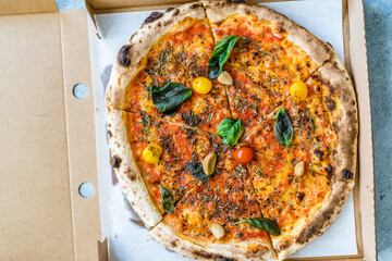 Take Away Neapolitian Pizza Marinara with Tomatoes, Oregano and Extra Virgin Olive Oil in Box.