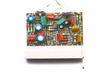 used retro electronic board with analog electronic elements and components. isolated on white...
