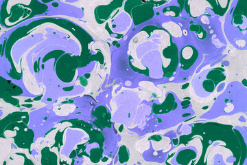 Colorful marble ink texture on watercolor paper background. Marble stone image. Bath bomb effect. Psychedelic biomorphic art.