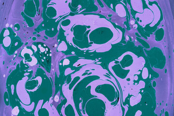 Colorful marble ink texture on watercolor paper background. Marble stone image. Bath bomb effect. Psychedelic biomorphic art.