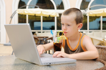 Little boy with a laptop