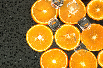 Orange slices with ice cubes