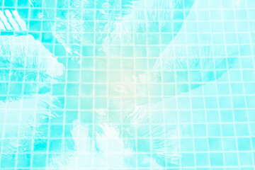 Abstract water texture background, coconut tree shadow on swimming pool water, tropical and summer concept background, vintage tone style