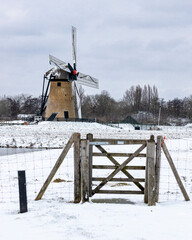 Windmill Pendrechtse molen in snow during winter