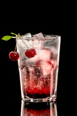 Summer fresh cocktail with soda and syrup and cherry
