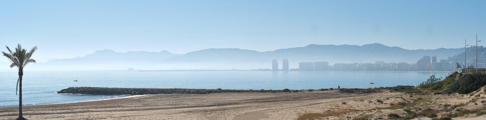 Panoramic view empty beach of Cullera town, Costa Blanca. Spain