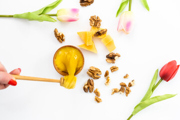 Walnut and honeycomb isolated on white background. For products with nuts and honey ingredients.