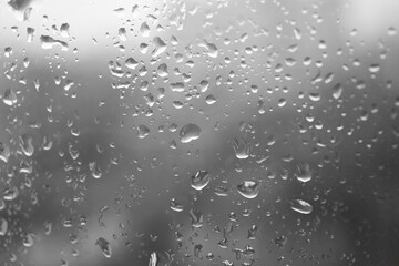 Water drops on window glass, closeup view