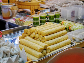 Pile of Steamed Fish Meat Sticks at Market Stall