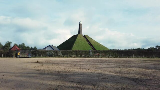 Pyramide of Austerlitz in the Netherlands, tourist taking photos