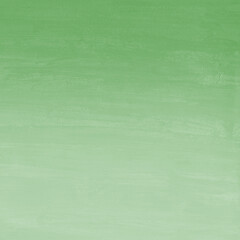 Green ink and watercolor texture on white paper background. Gradient paint strokes and decalcomania effect. Hand-painted gouache abstract image. Mess on the canvas.