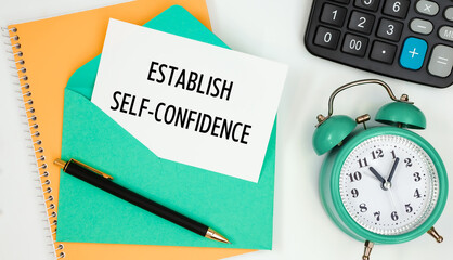 Card on a postal envelope with the text ESTABLISH SELF-CONFIDENCE