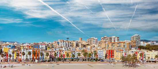 Aerial drone point panoramic view coastline and La Vila Joiosa Villajoyosa touristic resort townscape view from top, sandy beach and mediterranean seascape. Province of Alicante, Costa Blanca, Spain - obrazy, fototapety, plakaty