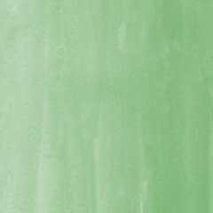 Green ink and watercolor texture on white paper background. Gradient paint strokes and decalcomania effect. Hand-painted gouache abstract image. Mess on the canvas.