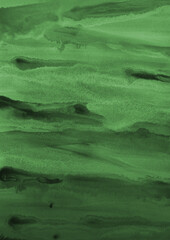 Green ink and watercolor texture on white paper background. Gradient paint strokes and decalcomania effect. Hand-painted gouache abstract image. Mess on the canvas.