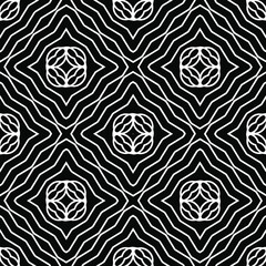  Geometric vector pattern with triangular elements. Seamless abstract ornament for wallpapers and backgrounds. Black and white colors.