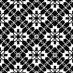  Geometric vector pattern with triangular elements. Seamless abstract ornament for wallpapers and backgrounds. Black and white colors.